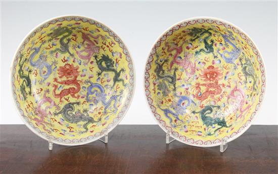 A pair of Chinese enamelled porcelain nine dragon bowls, Republic period, 21cm